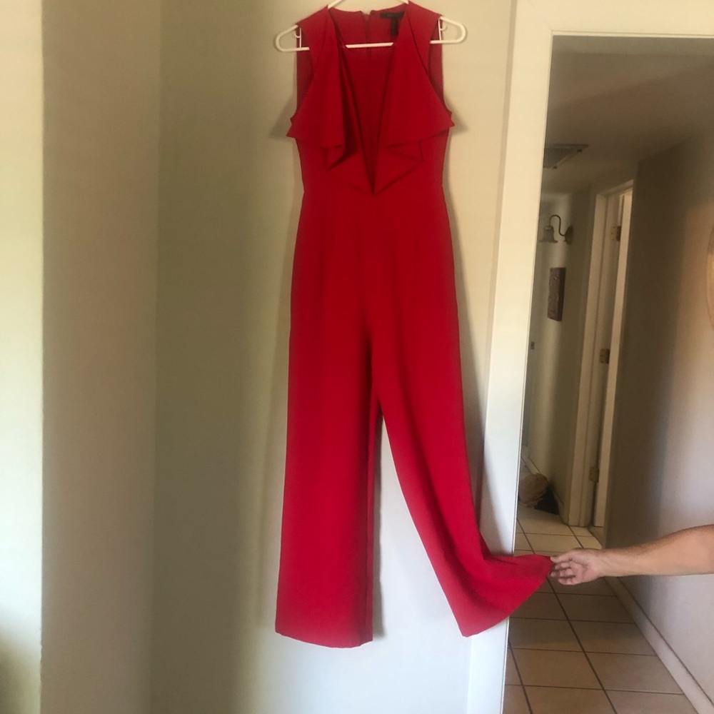Red BCBG jumpsuit with pockets